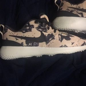 Light pink and navy Nike shoes